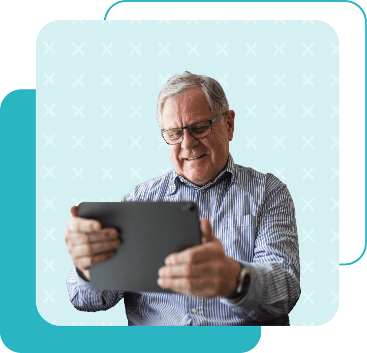 Older patient views medical practice marketing on his tablet