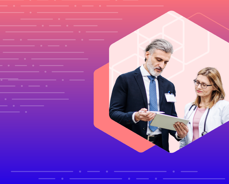 A doctor and a business worker discussing information on a tablet.