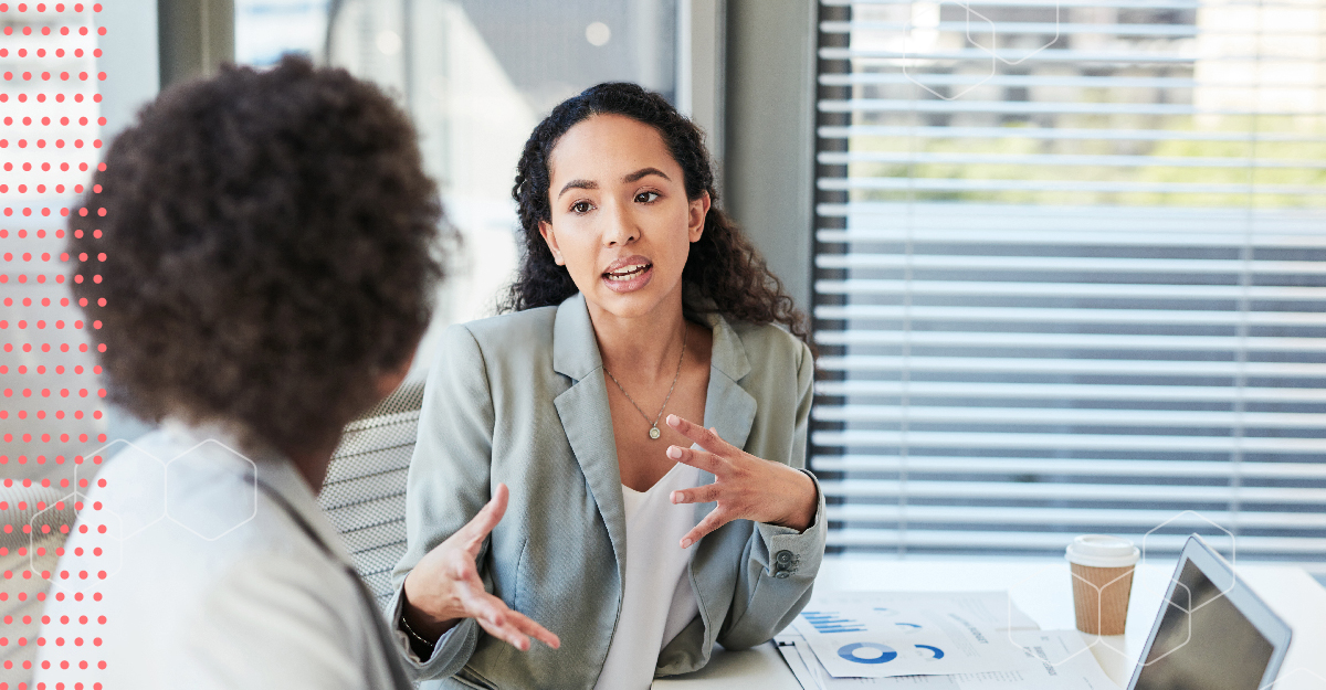 Business woman discussing economics with a doctor.