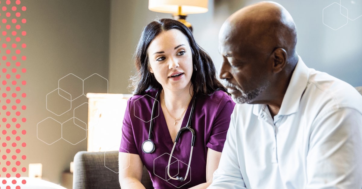 A Black man in discussion with a woman doctor.