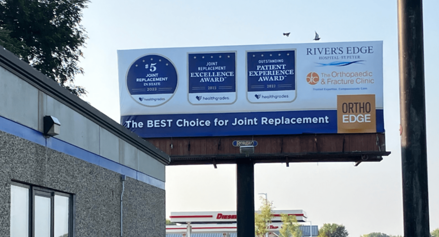 Billboard for River's Edge Hospital with three Healthgrades Awards medallions